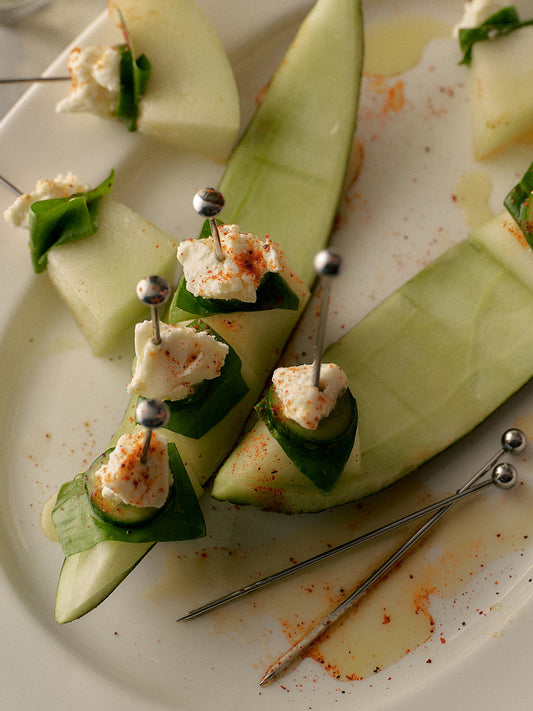 Recipe: Piel de Sapo Melon, Chèvre, Sorrel & Espelette Canapés